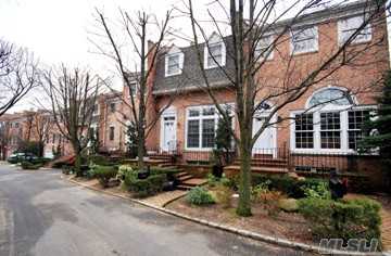 A Two Story Living Room With A Wall Of Windows Welcomes You To This Very Bright And Spacious Home.  Featuring A Kitchen, Breakfast Room, Dining Room, Family Room, Two Bedroom Suites Complete With Two Full Baths, And Two Additional Powder Rooms Plus One Garage All Very Convenient To Transportation( 2 Blocks To Lirr) And Town.Great Space!