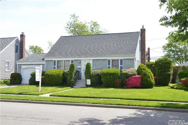 This Cape Cod Is Looking For Some New Owners ! This Home Comes With A Newer Roof, Burner, Hot Water Heater, Electric (150 Amps), Ductless Ac's & More ! Full Basement, Extended Attached Garage, Gas Heat, Inground Sprinklers, Rear Deck Overseeing Beautiful Back Yard & More ! Let's Get In For The Summer Barbeque !