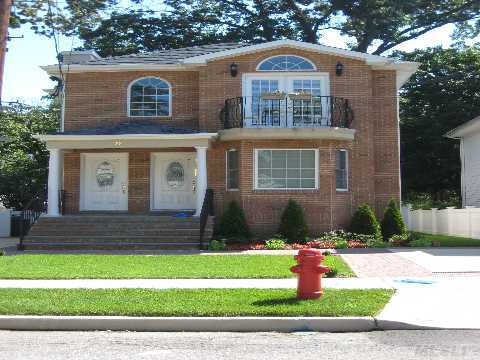 Built In 2006- Legal 2 Family House With 3 Bedrooms/2 Baths Over 2 Bedrooms/2 Baths.   Great Investment.First Floor,Has Use Of Full Finished Basement. Second Floor Has Vaulted Ceiling In Lr,2 Skylights And Balcony.Close To Park & Beach.