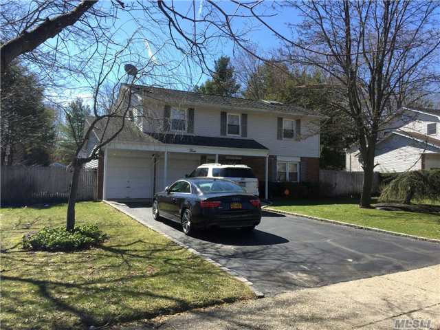 Great Home Rare Find Smithtown Mailing Address With Commack Schools. Wonderful Neighborhood With Sidewalks & Many Large Families. Hardwood Floors, Fireplace In Large Den, 2 Car Garage. Corian Counter, Cherry Wood Cabinets & Ss Appl's. New 200 Amp Electric - Save On Your Electric Bill.