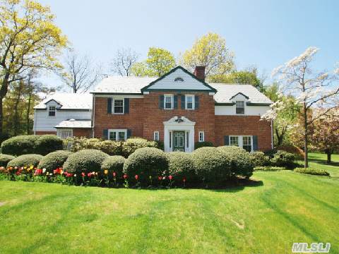 Classic Center Hall Colonial,  W/Old World Charm Featuring 4Br's,  3.55Bths,  Magnificent Grounds & Full Fin Bsmnt W/Fplce,  Wet Bar,  Wine Cellar & Gym. The Master Bedroom Suite Has A Fplce & Ensuite Bath W/Lrge Balcony Overlooking The Beaut Park-Like Yrd. Other Amenities Incl A Yng Vermont Green Slate Roof, New Hot Water Heater. Exclusive Broadlawn Harbor Pool/Dock ($2000/Yr).