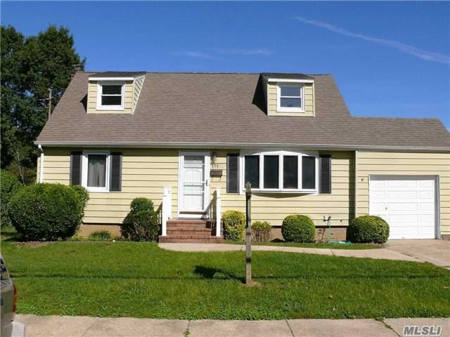Great Cape On A Great Block. House Has Radiant Heat And Wall Between Kitchen And Lr Has Been Opened Up. Freshly Painted And Ready To Move In. Priced Right