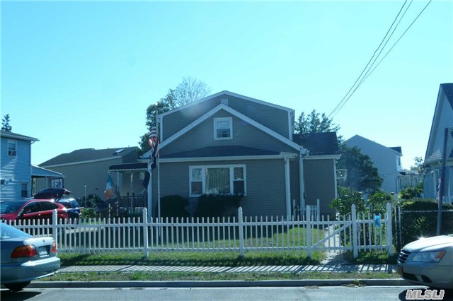 Beautiful 4 Bedroom Colonial On Large Property. New Kitchen, Baths, Boiler, Floors. Large Yard, Close To School 9E And Middle School, As Well As Shopping, Oceanside Park. The Beach Is 10 Minutes Away And 40 Minutes To Manhattan Via Lirr.