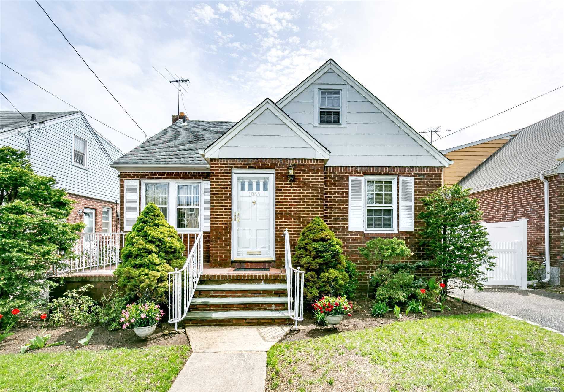 Charming Sun Drenched Rear Dormed Cape. 4 Bedrooms With 2 Full Baths, Formal Living Room And Dining Room, Fully Finished Basement With Separate Entrance . Great Backyard With Brand New Fence, Great For Entertaining. Detached Garage With Long Private Driveway.