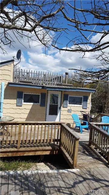 Great Beach House One From The Ocean With Fabulous View Of The Ocean!!!!!!!!!! It's A Real Cutie With Room To Expand. There Is A Wood Stove For Heat And A Nice Roof Top Deck And It Is Affordable