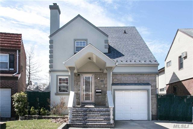 Brick & Stucco Colonial Features 3 Large Bedrooms & 2.5 Baths, Set On An Over Sized Lot With A Magnificent Backyard, This Immaculate Home Has Plenty To Offer. Updated Baths, Split Unit Cac, Radiant Heat In Kitchen And 5-Piece Bth, Custom Interior Doors, Built In Cameras & Much More!