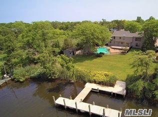 Sought After Private Sanctuary In The Moorings.One Of A Kind Prop On Wide Deep Canal Across From Beautiful Wooded Un Developable Land. Gorgeous 5Br, 3.5 Bths W/Cathedral Ceilings, 2 Story Ent Foyer. Just Remodeled, Renovated For Todays Lifestyle. Gunite Pool W/Jacuzzi, Approximately 100&rsquo; Waterfront W/New Dock. New Bathrooms, Kitchen, Roof, Heat, Ac, Driveway, And More!! Kitchen Ready For Your Choice Of Back Splash. Gated Community, 24 Hr Guard/ Association Tennis.