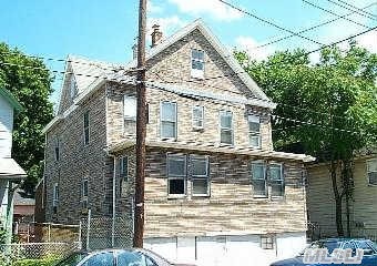 Handy Man Special,  Large Legal 2 Family W 3+ Car Garage And Private Parking,  Needs Updating 6 + Bedrooms,   3 Full Baths,  Living Rooms ,  Dining Rooms ,  Dens ,  Full Unfinished Basement,  Large Home W Big Rooms.