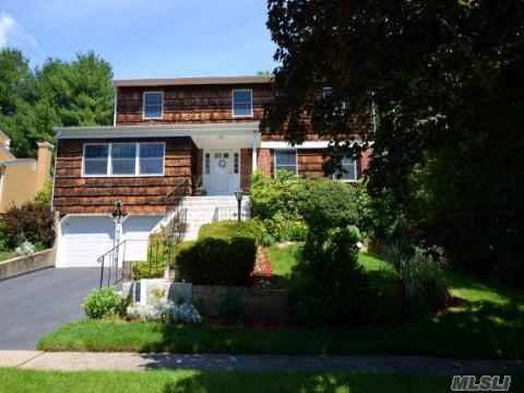 Oversized Colonial Located In N. Syosset. Updated Kit With S/S Appliances, Wood Floors Throughout, Woodburning Fireplace In Den, Large Bedrooms, Full Finished Basement, 2 Car Garage, Igs, Low Maintainence Property. Convenient To All.  Taxes Have Been Successfully Grieved.