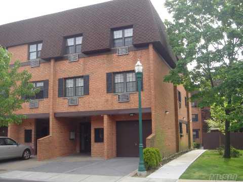 Excellent Condition ! 1st Floor Corner Unit With Many Windows. Prime Bayside Location!