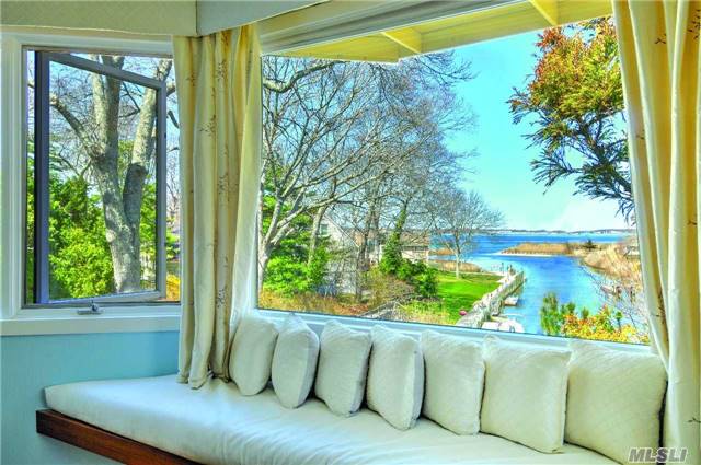 Privacy & Tranquility - Located In Harbor Lights Nestled Along Southold Bay Is This Thoughtfully Designed Home. Each Room, Deck & Patio Are Perfectly Positioned To Take In This Tranquil Waterfront. Lush Landscape Provides Great Privacy. Well-Appointed, 3 Br Incl Master, 3 Ba, 2 Fpl, & 40&rsquo; Floating Dock.