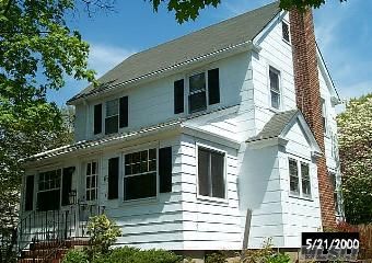 Just Reduced-Home Sweet Home!Lovely, Updated Colonial Boasts Wood Floors Throughout, Lr W/Fp, New Kitchen W/High End Ss Apps,  Part Fin Basement,Heated Enc. Porch, Attic, Brick Patio,New Roof, Walk To Town & Train From This Secluded Lane.