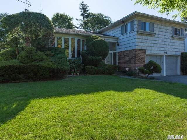 Don't Miss Out On This 'Majestic' Home On A Fantastic Mid-Block Location In West Birchwood.Features 4 Bedrooms,  3 Full Baths,  L-Shaped Living/Dining Room And Den. Outdoors You Have A Large Wood Deck Overlooking A Lap Size In-Ground Heated Pool,  Wrapped Around A Brick Patio. Jericho Schools.