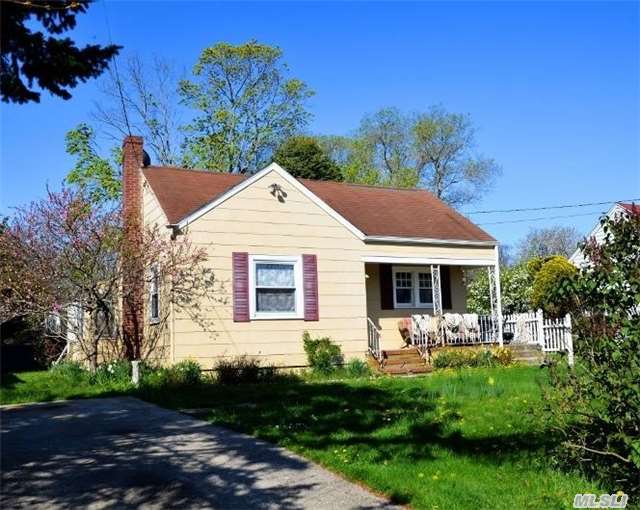 Summertime Cottage. Close To Town & Deeded Beach. Hardwood Floors, Charming Front Porch And Private Rear Yard. This Getaway Awaits Your Touches. Perfect Location For The Retreat.