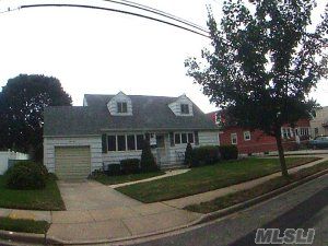 Well Maintained 5 Bedroom 2 Bth Cape On A Dead End Street. Perfect Yard. 2 Driveways, Full Basement, Anderson Windows, Roof Is Only 6 Yrs Old, Updated Heating System, Rear Dormer, Attached Garage. Great Location To Stores, Lirr.