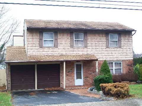 Mint Splanch Boasts Maple Kitchen W/Granite Counter Tops, New Boiler, Family Room W/F/P, Updated Bath, Updated Carpets, Some Hd/Wd Floors, Smithtown Schools!! Bring Checkbook!!!