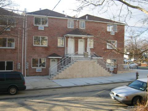 Brick Attached Two Family. Three Bedroom Duplex Apartment Over Two Bedroom Simplex Apartment, And A Fully Finished Basement. Two Car Parking In Driveway. 7 Years Left On Tax Abatement.