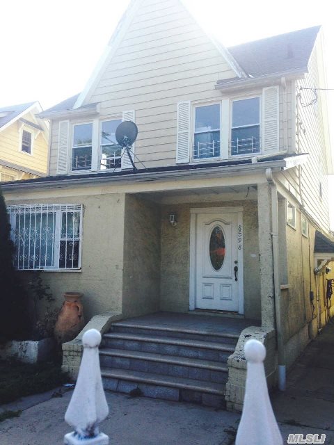 Detached 2 Family In The Heart Of Briarwood. Walking Distance To School And Train. 40 X 100 Lot. Detached Garage.