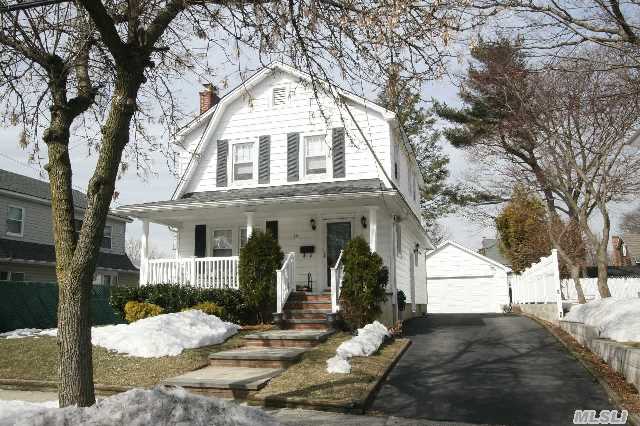 Charming Front Porch Colonial In Excellent Condition. 3 Bedrooms,  1 Bath. Large Formal Dining Room,  Eik With Granite Countertops. Hardwood Floors,  Full Basement. Deep Backyard. 2 Car Garage.