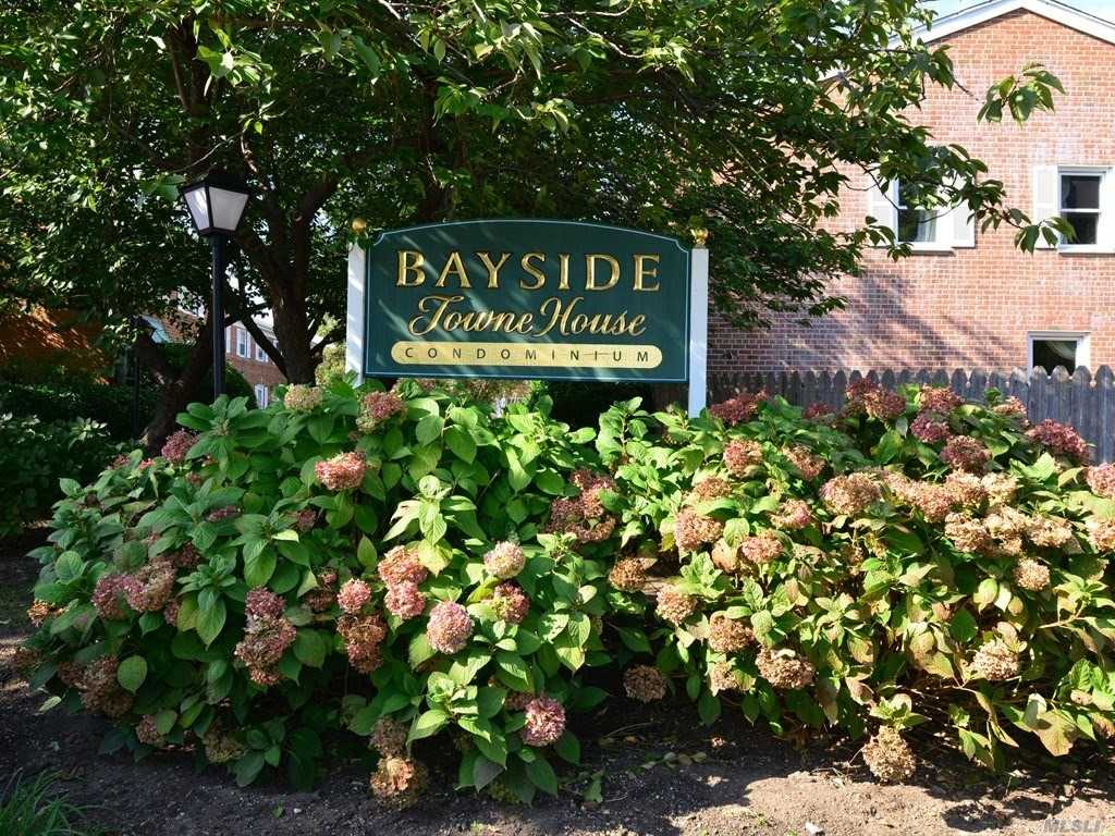 3 BR Townhouse Style Condo in the heart of Bayside. Best Location in the development. Wonderful Layout with EIK, Dining Room, large Living Room with hardwood flrs, Bath on Main Level and Upstairs. Full Finished Basement with Office, Work and Laundry room. Beautiful Private back Yard. Insulated & Vented Attic with finished, floor. Assigned Parking. Nearby are additional parking spaces, pool and tennis club, shopping, Bay Terrace, Express bus to NYC, Local buses, subways & LIRR. SD25, Pets OK!