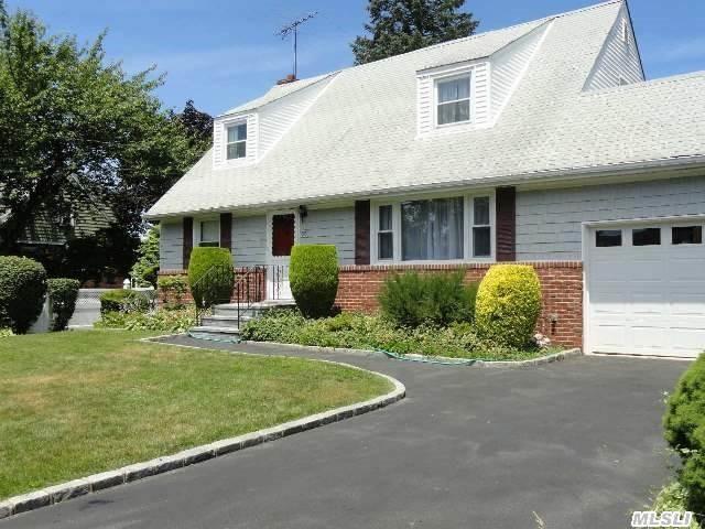 Welcome To This Spacious,  Lovingly Maintained Expanded Cape W/4Bedrooms And 2.5 Bathrooms! 2 Bdrms Upstrs W/Entertainment Area-Possible Mother-Daughter (Proper Permits Required) Or Possible Home Office. Full Finished Basement W/Utilities,  Guest Quarters. Lovely Landscaped Bkyrd. Beautiful Hdwd Floors-Bethpage Sd#21-Taxes Do Not Reflect Star Exemption Of $1150.97