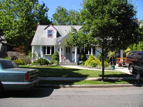 Outstanding Rear Dormed Cape. Mid-Block, Tree-Lined Location. Totally Renovated, New Roof, Heat, Eat In Kitchen, And Bath. Fantastic Yard With Shed, Deck, And Playground. Two Blocks From Elementary School And Bus To Middle School.