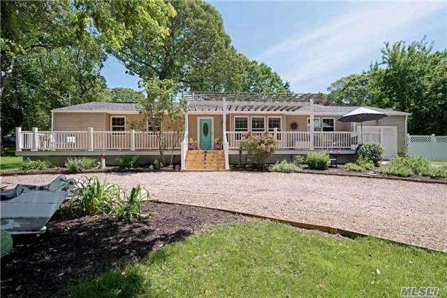 Expansive 3 Bedroom 2 Bath Ranch In Laughing Waters Beach Community. Newly Updated With An Inviting,  Sunny, Bright Lr, Fdr, Eik/ Great Room With Wood-Burning Stove And Rear Deck. Attached One Car Garage With Additional Storage And Bright Open Basement. Very Large Corner Lot With Beach And Marina Rights!