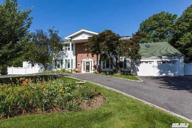 Stately Colonial With 5 Bedrooms, 2.5 Bths, Huge Fdr, Lr, Fam Rm, Eik, Master Suite, Marble Floors, Custom Woodwork, Country Club Backyard W/Igp, Outdoor Kitchen, Bocce Ball Court, Screened In Gazebo, Igs, 2 Car Garage.