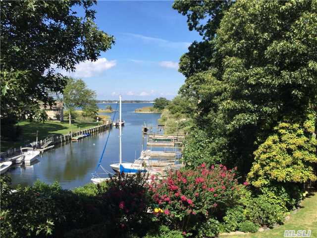 Better Than Bayfront Recent Hamptons Style Home In Desireable Harbor Lights Community. Home Sits On Safe Knoll Over Harbor W/Ownership Of 2 Slips/Private Dock And Immediate Access To The Peconic Bay. Flood Ins May Not B Necessary! Great Views To Si - Move In Ready Perfection - Top Tier All The Way.  Ass'n Bay Beach - Park And More.Convenient To All Nf Amenities.