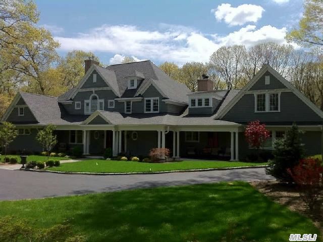 Rebuilt In 2008,  This Magnificent Country Colonial Features A Custom Kitchen With An Adjoining Fireside Den And State Of Art Media Room. Generous Rooms Are Adorned With Moldings,  Gleaming Hardwood Floors,  Cathedral Ceilings And French Doors. The Spectacular Covered Mahogany Deck Features A Fireplace And Overlooks The 2 Sublime Acres And Sparkling Pool. Jericho Sd