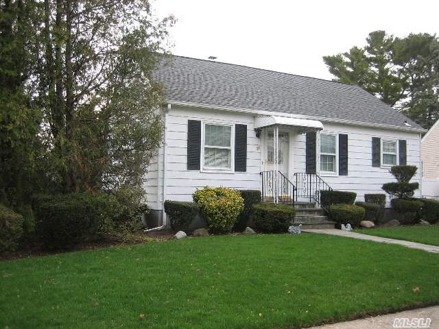 An Adorable & Affordable 2 Bedroom Ranch Situated On A Landscaped Oversized Park-Like Property In Award Winning School District#21. This Is A Perfect Starter Or Down-Sizing Home. The Property Consist Of An Extra Deeded Lot Of 20X100 Making The Entire Lot 80X100. Home Is Located Close To Shops & Railroad. Huge Detached Garage And Basement. 150 Amp Electric. New Boiler. Igs