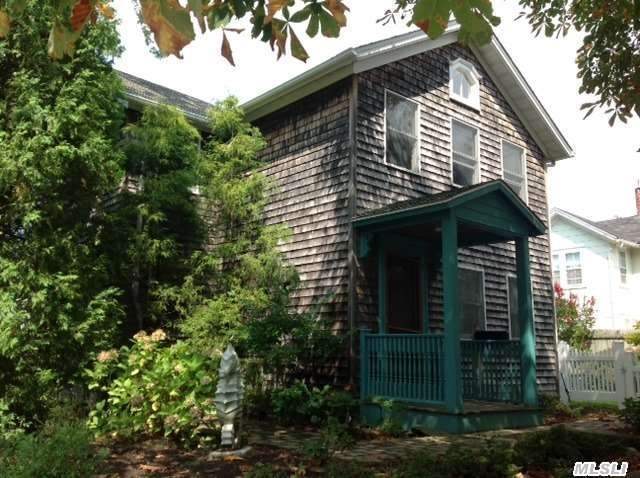 Privacy In The Heart Of Greenport Village. 1885 Cross-Gabled 2 Story Cedar Shake Home. Master Bedroom With Balcony & Ensuite Bathroom.  Professional Landscaped Private Yard.  Private Driveway. Three Blocks To Shops,  Restaurants And Waterfront Park.