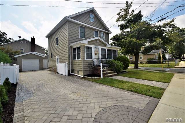 This Beautiful Newly Renovated Colonial In The Heart Of Lynbrook Is Perfect For Any Family Small Or Large, Award Winning School Sd #20, Close To Lirr, Amazing Vinyl Shake Siding, Architecture Roof, Central Ac, New 1.5 Car Garage, Brick Paver Driveway, Hardwood Floors, Hi Hats, Eat In Kitchen W/ Granite Counter Tops And Cherry Wood Cabinets.