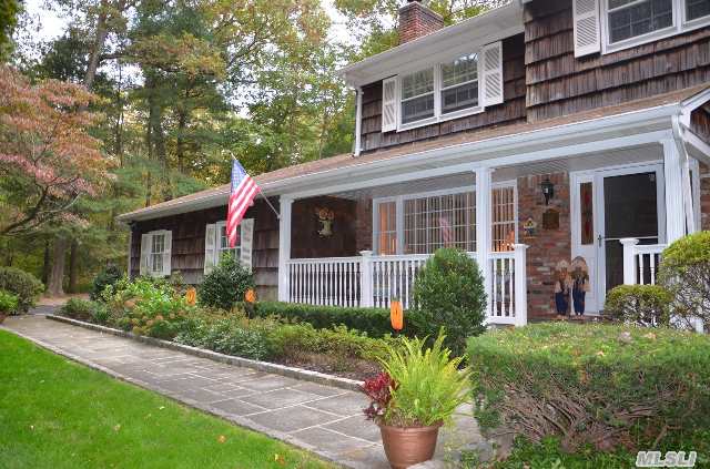 Pristine Colonial Nestled On Gorgeous 1.5 Acre Property On Cherry Lane W/Deck Overlooking Heated Pool. Spacious 5 Bedrooms,  Refinished H-Wood Flrs,  Updated Appliances,  Baths & New Windows & Sliders.  Mudroom W/Lndry On 1st Floor,  Fin Bsmt W/Playroom,  Den W/ Fireplace,  Wood Flrs And Ample Storage. Centrally Located To Shopping & Minutes To Lirr.  Berry Hill Elem/Sw Middle.