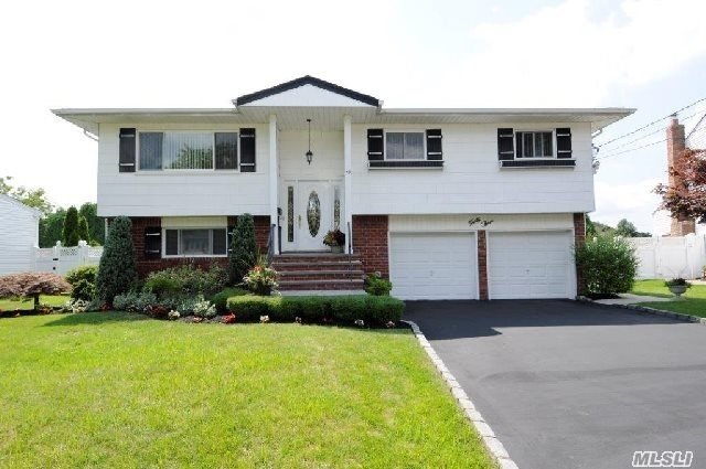 Location, Location! Mint & Updated 4 Bedroom-2 Full Bath Hi Ranch Situated On A Private Cul-De-Sac In Desirable Bethpage Estates. Spacious Liv Rm & Formal Din Rm-Eik W Skylight-Slider To Deck-New Full Bath-Family Rm W Fplc-Hdwd Flrs. Prof Manicured Property-O/S Private Yrd Great For Entertaining-Pvc-Igs-2 Car Drvway-Poss M/D W Pp-Bethpage Sd21. Just Unpack & Move Right In!