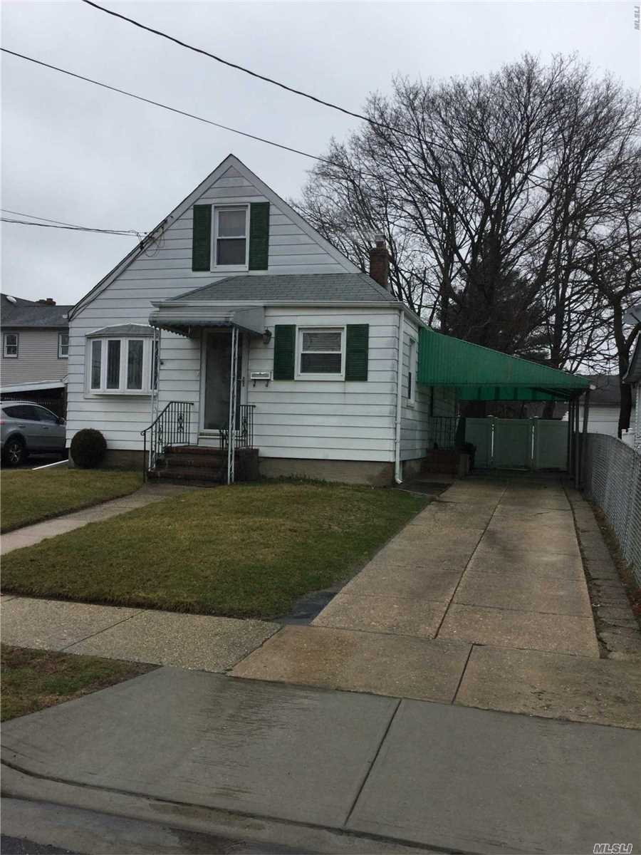 Charming Cozy Cape, In Great Well Kept Condition, On A Beautiful Oversized Piece Of Property, Close To All. Transportation. Beautiful Finished Basement, Great Family Rm, High Ceilings, Laudry Room.