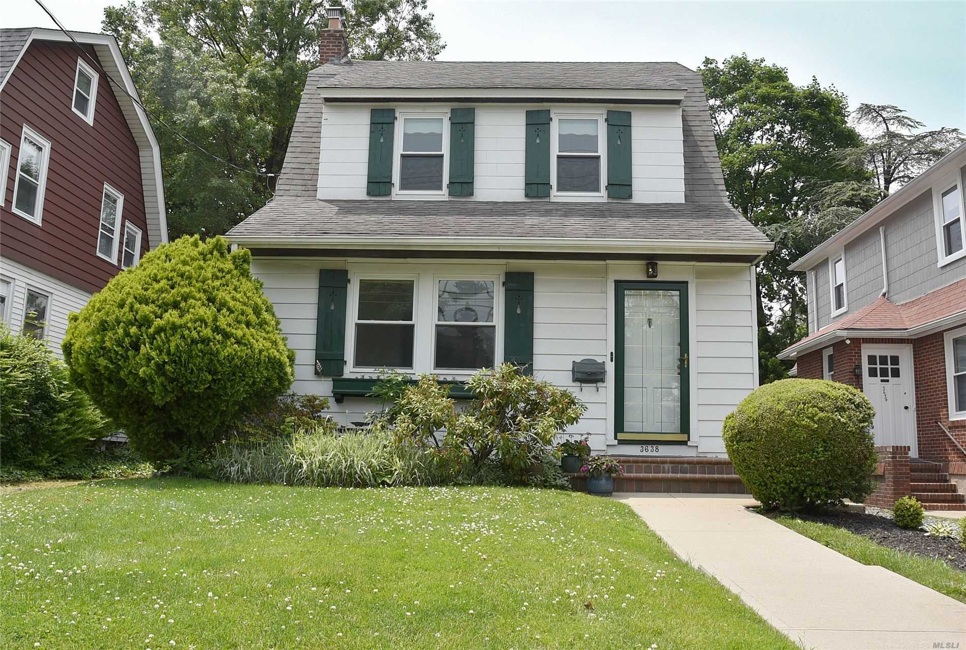 Great PRICE IMPROVEMENT in beautiful Bell Court! Traditional two bedroom, one bath colonial on a quiet tree-lined street only blocks to the L.I.R.R., shops, restaurants, houses of worship. Oversized 40 x 100 property with private driveway. Prestigious school district #26 . PS 159/MS 158. Full basement with side entrance. The best value in Bayside!