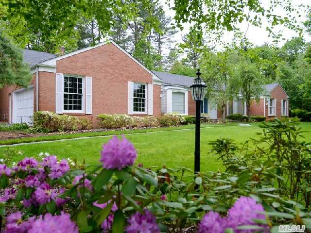 As You Enter Into A Large Marble Entry Foyer You Immediately Feel The Elegance Of This Stately Brick Ranch.  There Are 2 Fireplaces,  One In The Living Room,  One In The Den And All The Rooms Have 9 Ft Ceilings.  The 1 Acre Property Is Beautifully Landscaped And Private.