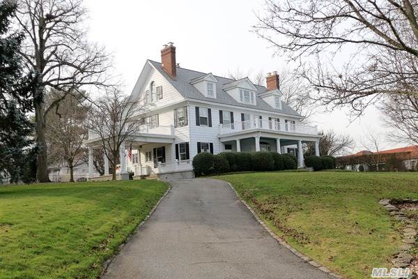 Charm And Grace Exude From This Beautifully Situated Home On A Private Road In Plandome. Built In 1908. An Inviting Porch Welcomes You Into A Center Hall Colonial Filled With Architectural Details And Spacious Rooms With Views Of Manhasset Bay.
