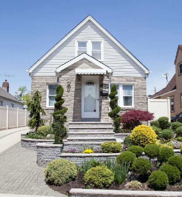 A Beautiful Home With Gorgeous Landscaping,  This 4 Bedroom,  2 Bath Stone & Frame Cape Is The Epitome Of Turn-Key! Simply Stock The Pantry & Fridge And Connect Your Electronics And Move Right In. Top This All Off With An Ideal Location In Fresh Meadows And Here It Is - Your Dream Home!