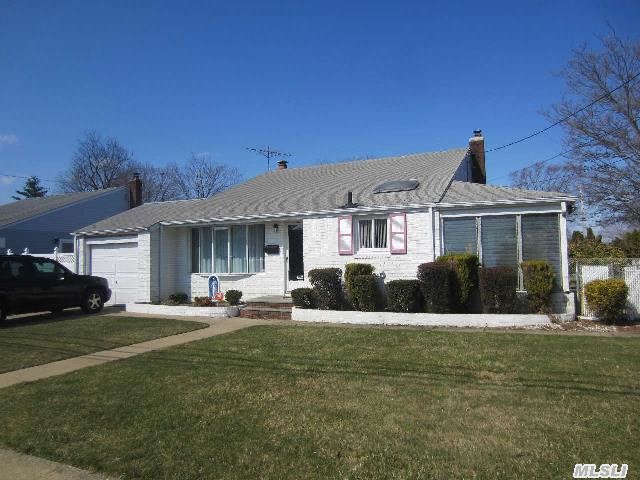 Village Split,  Skylit Kit,  Fam Rm W/Fpl,  Dr,  Sun Room,  Hardwood Floors,  Mostly Andersen Windows,  Ig Sprinklers,  In Ground Pool As Is. Village Amenities & Prime Schools. Big House,  Big Property Looking For Someone Who Can Give It A Little Tlc