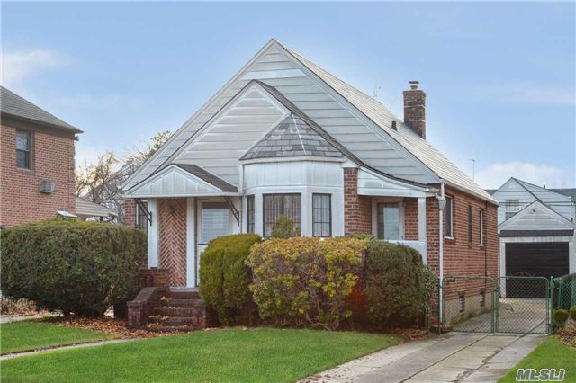 Beautiful Cape House Situated In The Heart Of Fresh Meadows. It Features 3 Bedrooms, 2 Full Bathrooms, Hard Wood Floors, Central Ac And Finished Basement. Garage And Long Driveway And Beautiful Back Yard. Close To Mass Transit, Highways, Parks, Shops And All. Excellent Condition. A Must See