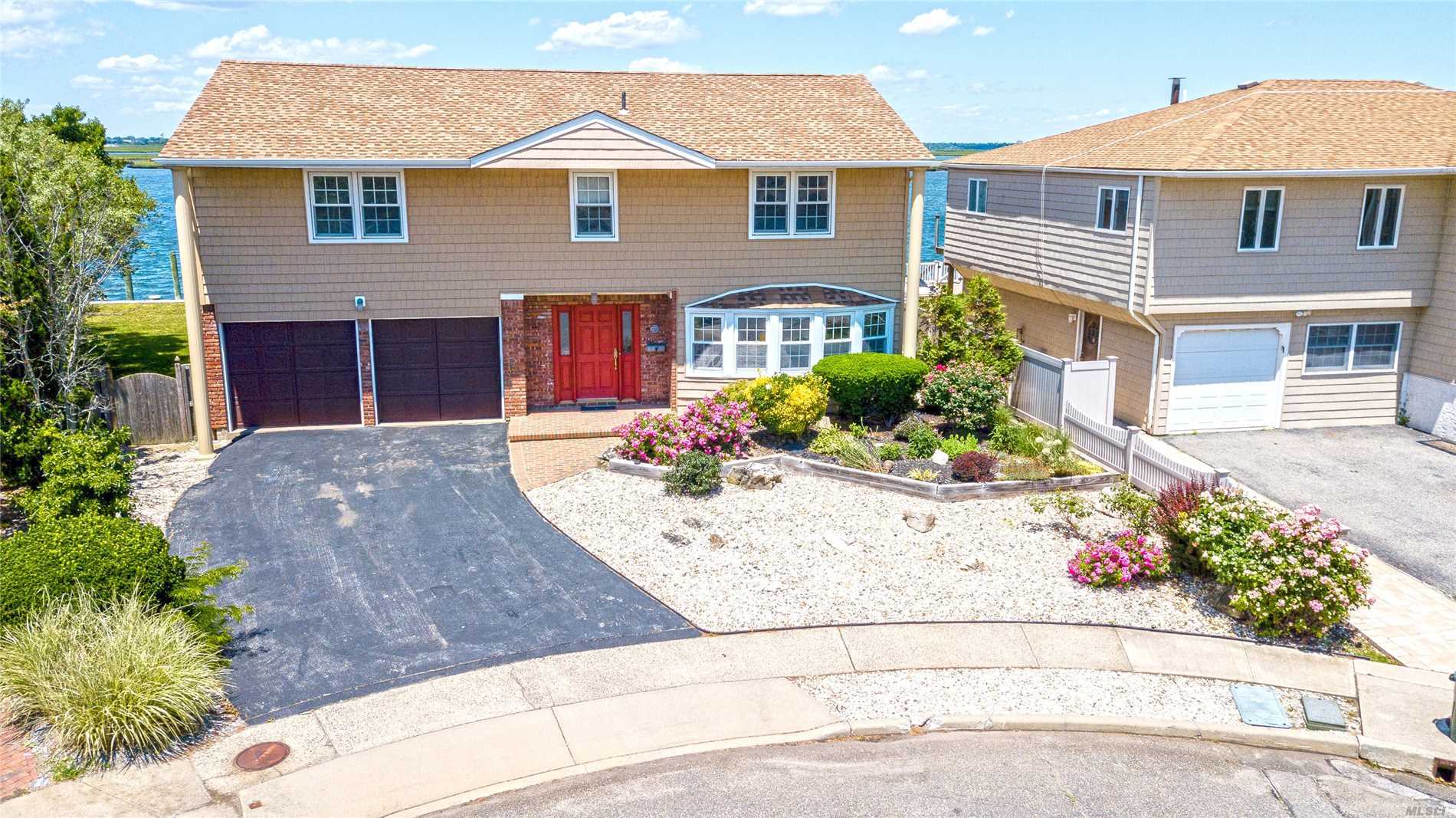 Priced To Sell! Expansive Open Bay Lido Splanch Boasting Over 3000 Sq Ft Of Living Space. Features New Bulkhead, Parklike Back Yard With Room Enough For A Pool. 1st Level: Foyer, Sunny Living Rm, Formal Dining Rm, Eat-In Kit, 1/2 Bth & Laundry. 2nd Level:Large Den W/Fp & Sliders To Deck 3rd Level: Enclosed Screened-In Porch, Master Bdr Ensuite, 3 Additional Bedrooms & Full Bath. Bring Your Sailboat And Enjoy Spectacular Bay Views Year Round!