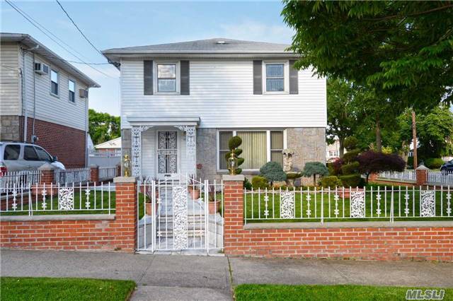 Beautiful And Spacious Detached Colonial W/ Lovely Hardwood Floors Throughout. Sprinkler System. Upgraded Kitchen And Bathrooms. Convenient To Shopping Transportation - Q 31 Buses & Q27 To Main Street, & Lirr Lirr. Beautifully Landscaped Corner Property.