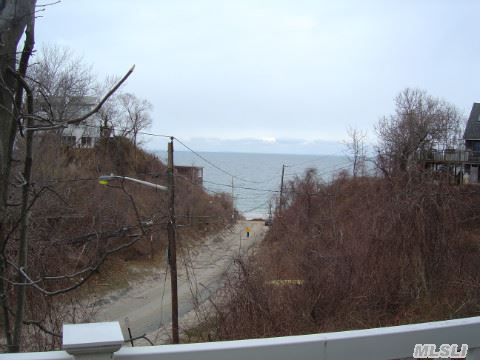 Summers On The Sound,  Wrap Around Deck,  2 Parking Spaces,  Private Beach,  Swim,  Fish Or Boat,  Just Steps Away.  All Viewable From Your Cottage,  Inside Or Out.  You Have To See It For Yourself.  Just 10 Years Young.