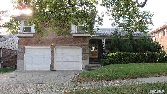 Beautiful Brick 60X100 Large Split-Level In Prime Neighborhood. Newly-Renovated. Cathedral Ceiling In Living Rm. Granite Kitchen And Hardwood Floor. New Baths With Jacuzzi. Excellent School District. Walk-To Ps 203 And Cardozo Hs. Close To Alley Pond Park,  Playground And Express Buses To Manhattan.