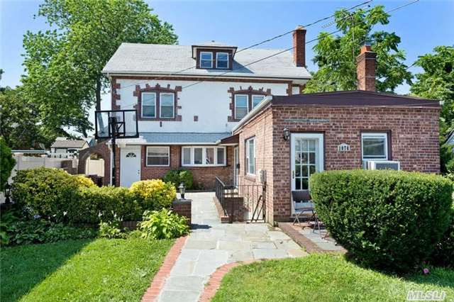 Charming Brick Colonial On Tree Lined Street,  Updated Wood Eik , Spacious Living Room And Formal Dinning Room, 5 Bedrooms, 2 Out Of 3 New Baths, Finished Basement, Beautiful Property.