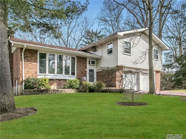 Wonderful Spacious Split, Cathedral Ceilings With Skylights. Den With Sliding Doors To Wonderful Garden , Vaulted Kitchen With Corian Counters. Hardwood Floors. Lower Level Den, Bedroom And Full Bathroom. Conveniently Located Within Minutes From Town, Train, Buses, Shopping. E.M. Baker Elementary School. Option Gn South/North Middle & High Schools.