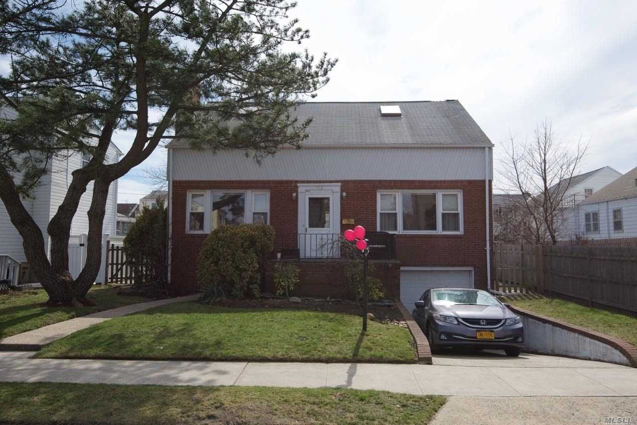 Beautiful Westholme Area, Boasting A 3 Bed (Possible 4th), 2 Bath Colonial Home With Hardwood Floors Throughout. Updated Kitchen, Formal Dining Room, Living Room With Fireplace. Huge Backyard! Steps To The Beach, Shops And Lirr