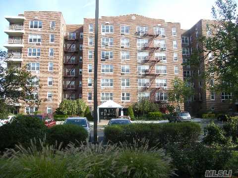 Sunny, Bright & Spacious Apartment, Great Condition, Entrance Foyer, Eff. Kitchen, 30' Living/Dining Room, One Large 17' Bedroom, One Bath, Wall To Wall Carpeting, Closets. Near Shopping, Express Bus To Nyc, Schools, Highways.  Laundry Room In Bldg. Private Parking Spot Included (Worth $15K). Security, Cable-Time Warner/Verizon Fios